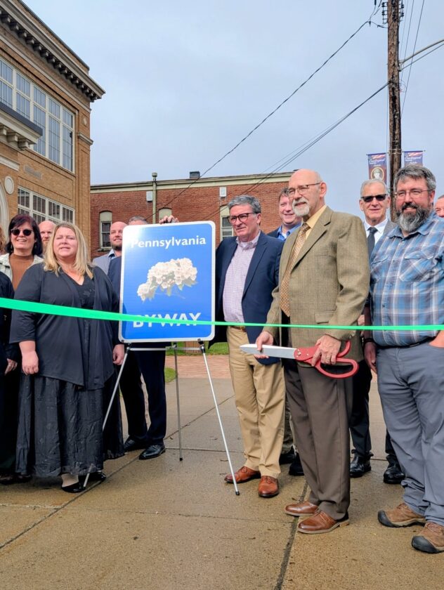 Photos submitted to the Times Observer Warren County Commissioner Dan Glotz, who is also the PA Route 6 Alliance board president, prepares to cut the ribbon on the Route 6 Scenic Byway in Coudersport.